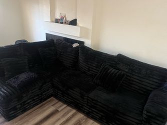 Sectional couch- refrigerator & fireplace tv stand.