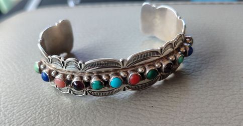 Navajo Native American made sterling silver bracelet with gemstones