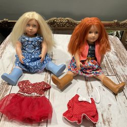 TWO OUR GENERATION DOLLS WITH EXTRA CLOTHES