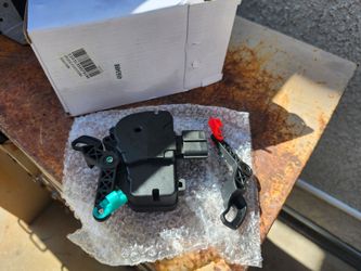 Door actuator dogde grand caravan