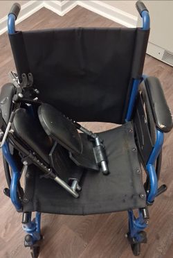 Wheelchair With Leg Rests