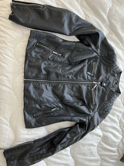 Brand New Leather Jacket with zippers 