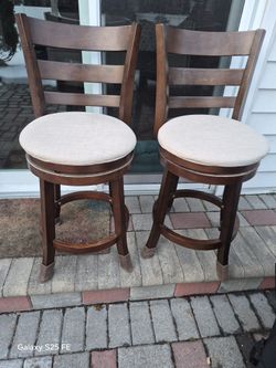 Two All wood counter height Stools