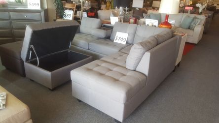 Brand new 102" x 81" dark or light grey storage sectional + ottoman