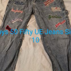 Vintage Boys 10 Fifty 50 Denim Blue EU Jeans. 5 Pocket, Carpenter Style With Embroidered Cities. Ramie 55%, Cotton 45%, Waist 26, Inseam 25.