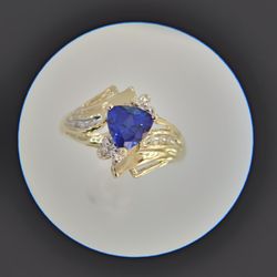 Trillion Cut Sapphire and Diamond Ring