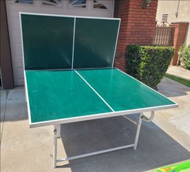 Taking Best Offer. Classic Ping Pong table, heavy duty built. Paddles, balls and net included. Great condition. Taking Best Offer.