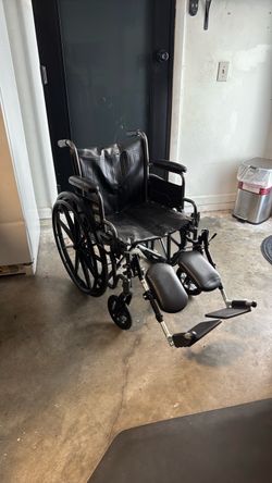 Black Manual Wheelchair with Leg Rests