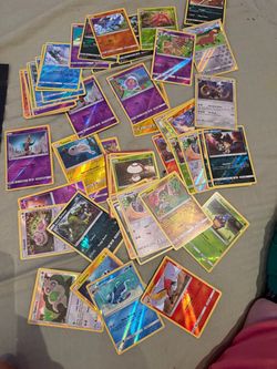 Pokémon TCG Unified Minds Reverse Holo Bulk Lot – around 50 Cards