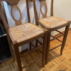 A Pair Of Pottery Barn Napoleon Bar Stools
