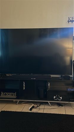 75” TCL including tv stand and surround speakers