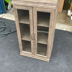 Cabinet With Glass Opening Doors 