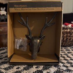 Wall mounted bottle opener