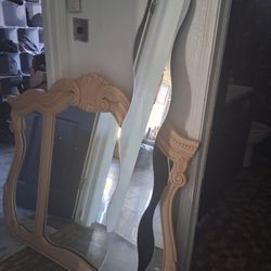 Long curved mirror