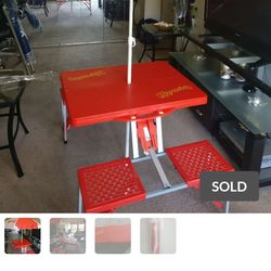 Kahuna portable foldable picnic table inside or out. Like new great for holidays for kids or adults umbrella is missing $18