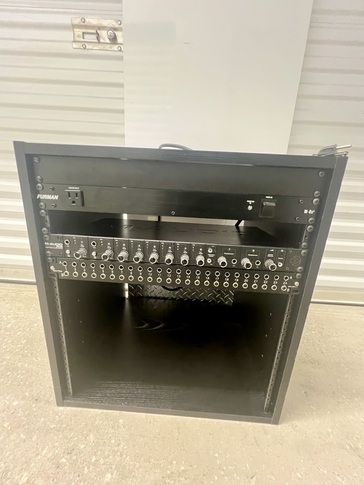 Musician equipment rack (reverb, nutrik, switch outlet)