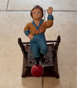Boy On Trapeze Cast Iron Mechanical Bank