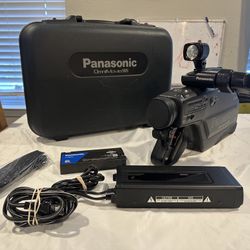 Panasonic OmniMovie VHS PV-950 camcorder with hard case and accessories