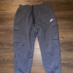 Dark grey Nike sweats