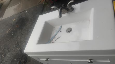 White Bathroom Vanity with Sink and Faucet