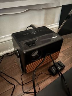 RCA Mini Projector with Power Adapter w/ sound bar