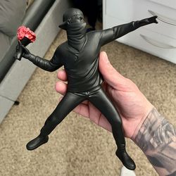 Banksy inspired sculpture figure