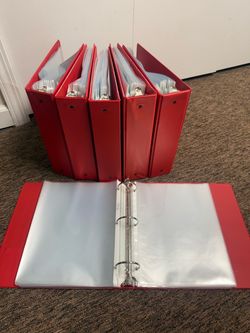 Red binders and page protectors