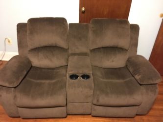Two seat reclinable couch with console storage