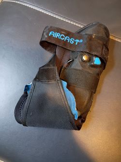 Air cast ankle support adjustable