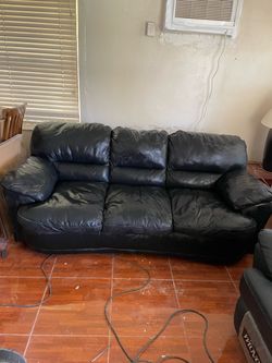 Leather sofa and recliner rocker chair