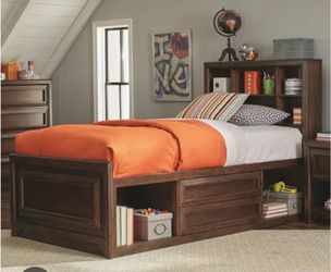 Twin bed with bookcase and drawers built in