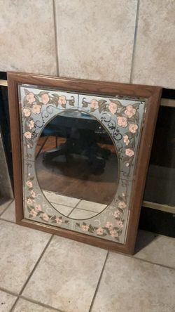 rose trimmed vintage mirror