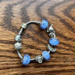 Silver Bracelet In Blue With Rhinestones And Charms