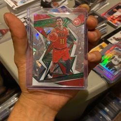 Trae Young 2019-20 Panini Revolution Chinese New Year Emerald /88 No.13 