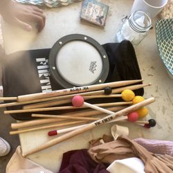 drum sticks with practice pad