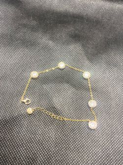 Stamped .925 silver n 18k gold platted with diamonds