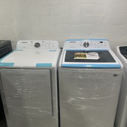 BRAND. NEW  WASHER AND. DRYER.