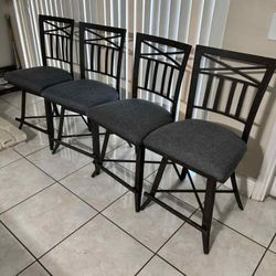 4 Wrought-Iron Swivel Bar Stools