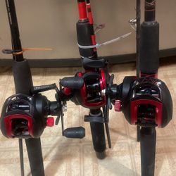 Three Brand New Bait Casters With Fishing Poles