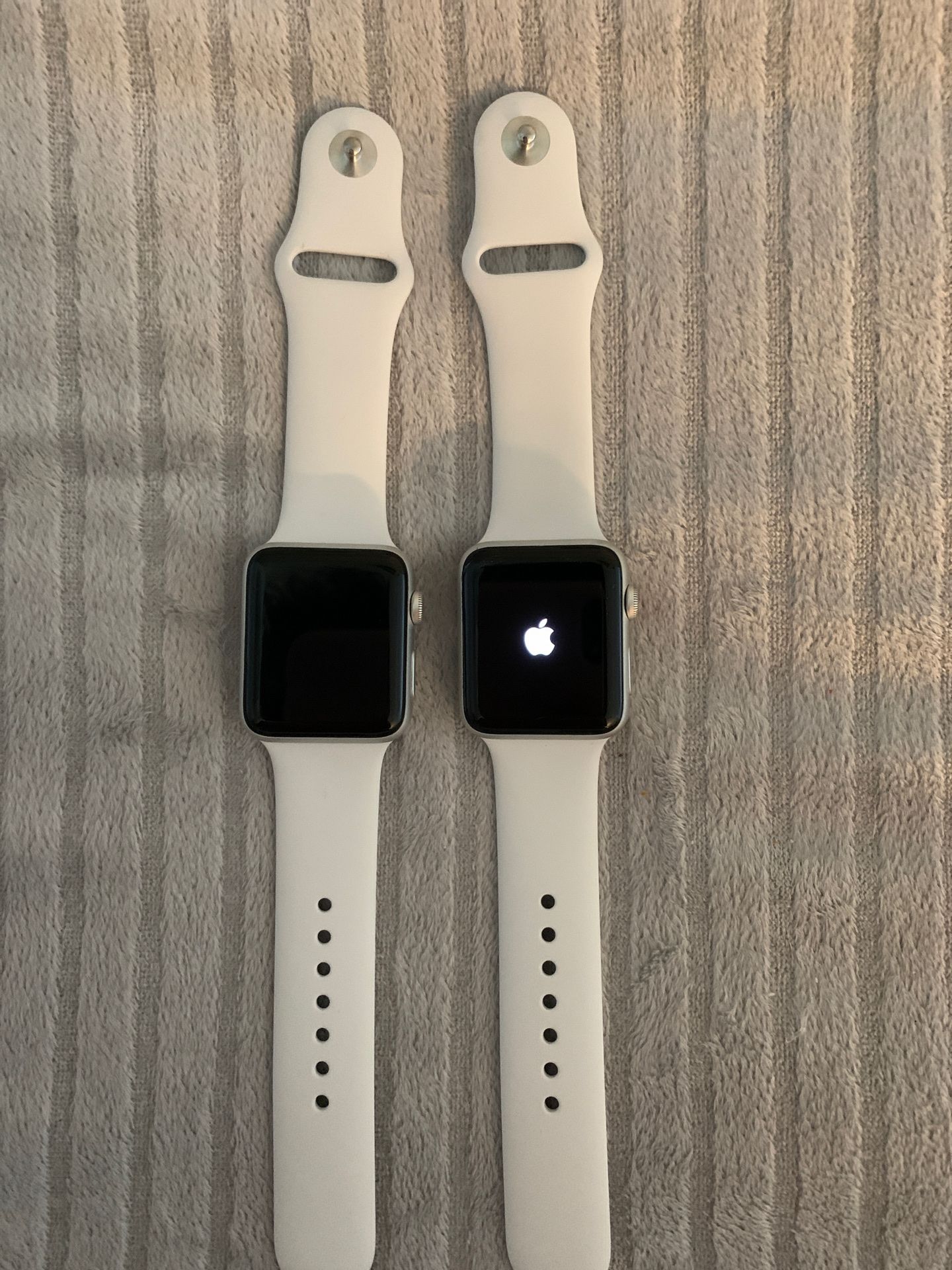 Used, 42mm silver Apple Watch, out of box and charger not included (1 available)