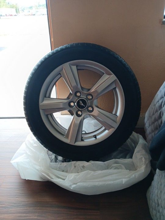 4 Mustang Stock Rims With Tires