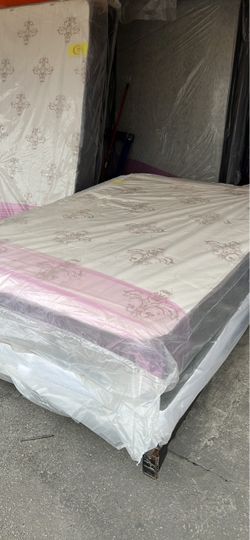 New queen mattress and box spring 2 pc  bed frame is not included