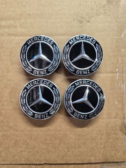OEM Heavier Plastic. Mercedes Black Center Hub Caps