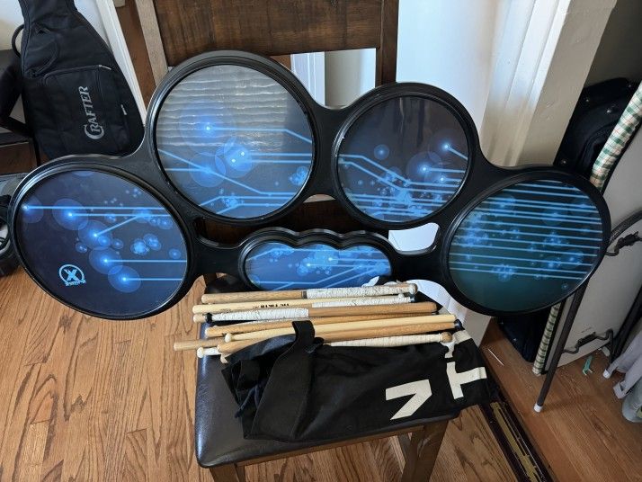 $90 β Xymox Tenor Drum Practice Pad w/ Drumsticks & Bag