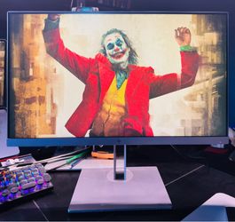 HP EliteDisplay E243 23.8-inch monitor with stand and cables.