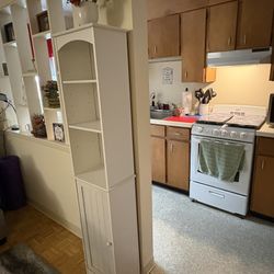 Moving Tall White Cabinet $10