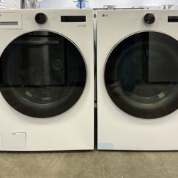LG 4.5 cu. ft. Front Load Washer w/Steam 7.4 cu. ft. Vented Gas Dryer w/Al Sensor Tech