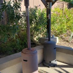two outdoor patio heaters 