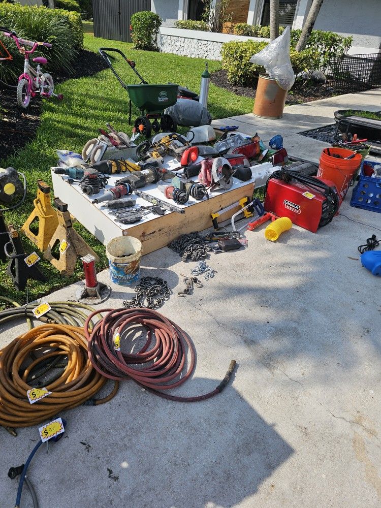 Various tools, welder, jack stands