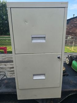 Beige vertical metal filing cabinet